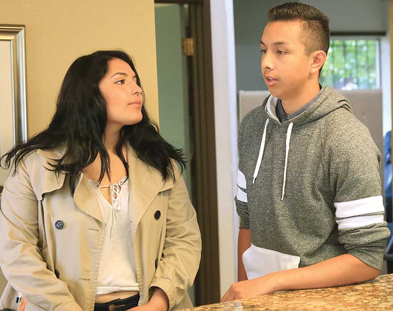 Watsonville High School students Kimberly Ortiz and Eduardo Lemus pay visit to the dental office of Gilbert J. Grio during the job shadow event.